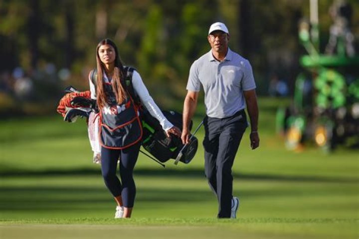 Tiger Woods Daughter Sam Serves as His Caddie at PNC Championship Hollywood Life